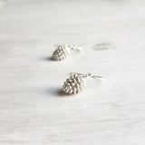 Silver Pine Cone Earrings - small matte silver plated mini pinecone charms on tiny silver plated hooks - minimalist and simple - Constant Baubling