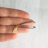 Gold Feather Bracelet, grey cord bracelet, gray gold bracelet, thin bracelet, stacking bracelet, twisted bracelet, minimalist, simple charm - Constant Baubling