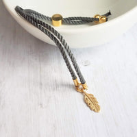 Gold Feather Bracelet, grey cord bracelet, gray gold bracelet, thin bracelet, stacking bracelet, twisted bracelet, minimalist, simple charm - Constant Baubling
