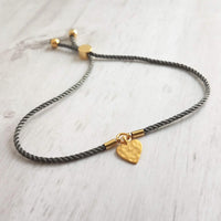 Rope Bracelet, matte gold heart charm, grey twisted cord, thin string, gold medallion, adjustable gray cord silky stacking layering bracelet - Constant Baubling