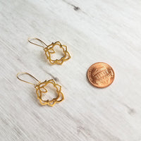 Lotus Earrings - gold ornate flower outline charms dangle on simple latching kidney ear hook - goddess rebirth triumph purity symbolic gift - Constant Baubling
