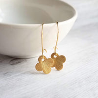 Gold Clover Earrings - small brushed 4 lobe leaf good luck charm dangle on simple latching kidney ear hook - St Patricks Day gift - Constant Baubling