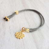 Cord Bracelet - grey silk style thin twisted rope - gold semicircle medallion charm - adjustable /one size fits most - gray stacking layer - Constant Baubling