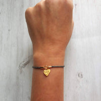 Rope Bracelet, matte gold heart charm, grey twisted cord, thin string, gold medallion, adjustable gray cord silky stacking layering bracelet - Constant Baubling