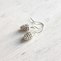 Silver Pine Cone Earrings - small matte silver plated mini pinecone charms on tiny silver plated hooks - minimalist and simple - Constant Baubling