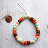 Orange Blue Brown Bracelet, 70s colors, large pony bead bracelet, tie on bracelet, cord bracelet, big faux glass beads, chunky bead bracelet - Constant Baubling
