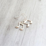 Silver Music Note Earrings, small sterling silver dangle, tiny music earring, eighth note charm, singer musician conductor teacher gift - Constant Baubling