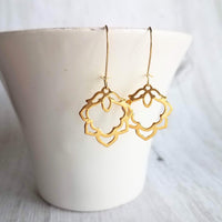 Lotus Earrings - gold ornate flower outline charms dangle on simple latching kidney ear hook - goddess rebirth triumph purity symbolic gift - Constant Baubling