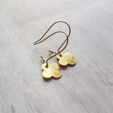 Gold Clover Earrings - small brushed 4 lobe leaf good luck charm dangle on simple latching kidney ear hook - St Patricks Day gift - Constant Baubling
