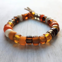 Autumn Bracelet - orange, tan, brown glass big bead tie on faux suede cord, chunky glass pony roller beads, VSCO girl, fall color jewelry - Constant Baubling