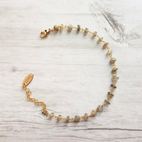 Labradorite Bracelet, tiny grey stone, semi precious gemstone, adjustable gold chain, vitreous iridescent blue green flash, spiritual symbol - Constant Baubling