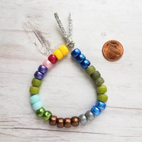 Crow Bead Bracelet, designer style bracelet, large bead tie on cord, big bead bracelet, ugly color bracelet, pony roller beads, chunky beads - Constant Baubling