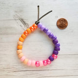 Beach Bracelet, sunset bracelet, ombre bead bracelet, large roller bead, crow bead bracelet, faux glass beads chunky bead purple pink orange - Constant Baubling