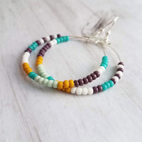 Beaded Silver Hoop Earrings, thin circle earring, beaded hoop, seed bead earring, beaded earring, mint, mustard, turquoise, plum brown, tiny - Constant Baubling