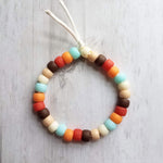 Orange Blue Brown Bracelet, 70s colors, large pony bead bracelet, tie on bracelet, cord bracelet, big faux glass beads, chunky bead bracelet - Constant Baubling