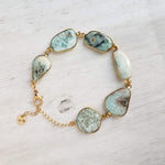 Blue Stone Bracelet - genuine Larimar gemstones in 14k gold plate bezel frame & adjustable chain - sky powder baby blue oblong facet cut - Constant Baubling