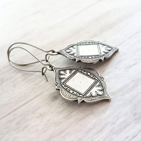 Moroccan Trellis Earrings - antique silver finish thick fanciful medallions on long stainless steel hypoallergenic latching kidney hooks - Constant Baubling