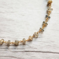 Labradorite Bracelet, tiny grey stone, semi precious gemstone, adjustable gold chain, vitreous iridescent blue green flash, spiritual symbol - Constant Baubling