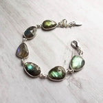 Labradorite Bracelet, oval stone bracelet, chunky stone bracelet, gemstone bracelet, silver frame, iridescent stone metallic flash bracelet - Constant Baubling