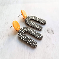 Large Chunky Earrings, 80s style earrings, 80's earrings, black white polka dot earring, U shape earrings acrylic dangle 2 in orange acetate - Constant Baubling