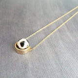 Eclipse Necklace, silver hematite stone ball, gold half circle pendant, mixed metal necklace, lunar eclipse jewelry, spinning ball bead moon - Constant Baubling