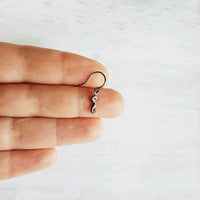 Seahorse Earrings - little tiny black gunmetal silver charms dangle on small simple shiny delicate hooks, minimalist tropical beach memento - Constant Baubling