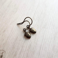 Mini Acorn Earrings - small black silver gunmetal squirrel nut charms dangle on delicate shiny little ear hooks, fall autumn jewelry - Constant Baubling