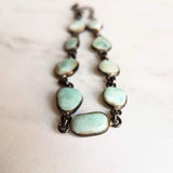 Blue Larimar Bracelet w/ shiny black gunmetal bezel frames, small organically shaped oval gemstones, aqua genuine stone adjustable chain - Constant Baubling