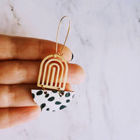 Large Leopard Print Earrings - gold brass rainbow arches w/ black white pony cow spots, long latching kidney ear hooks, 3 inch, cork leather - Constant Baubling