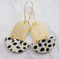 Large Leopard Print Earrings - gold brass rainbow arches w/ black white pony cow spots, long latching kidney ear hooks, 3 inch, cork leather - Constant Baubling