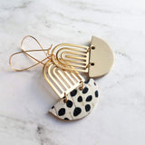 Large Leopard Print Earrings - gold brass rainbow arches w/ black white pony cow spots, long latching kidney ear hooks, 3 inch, cork leather - Constant Baubling