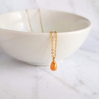 Orange Drop Necklace -  very tiny cantaloupe color glass pendant, 14K gold fill chain, delicate small little teardrop, gift for her under 30 - Constant Baubling