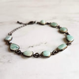Blue Larimar Bracelet w/ shiny black gunmetal bezel frames, small organically shaped oval gemstones, aqua genuine stone adjustable chain - Constant Baubling