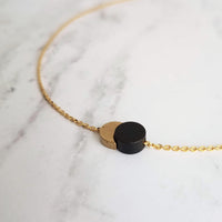 Sun Moon Necklace - solar eclipse pendant on delicate chain, celestial jewelry, moon shadow necklace, black gold crescent jewelry, new moon - Constant Baubling