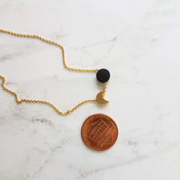 Sun Moon Necklace - solar eclipse pendant on delicate chain, celestial jewelry, moon shadow necklace, black gold crescent jewelry, new moon - Constant Baubling