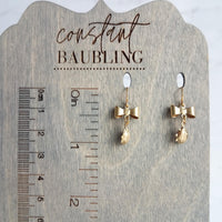Little Ladybug Earrings, gold bow earring, gold lady bug charm, lady bug earring, gold ladybug earring, small ladybug, ladybug dangle insect - Constant Baubling