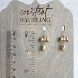 Little Ladybug Earrings, gold bow earring, gold lady bug charm, lady bug earring, gold ladybug earring, small ladybug, ladybug dangle insect - Constant Baubling