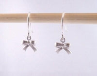 Tiny Silver Bow Earrings, small bow earring, tiny ribbon earring, tied ribbon earring, bow dangle earring, little silver bow earring, mini - Constant Baubling