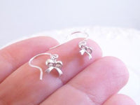 Tiny Silver Bow Earrings, small bow earring, tiny ribbon earring, tied ribbon earring, bow dangle earring, little silver bow earring, mini - Constant Baubling