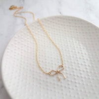 Gold Bow Necklace - 14K gold filled necklace, small bow necklace, bow pendant, wire bow necklace, little bow necklace, bow charm, simple bow - Constant Baubling