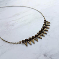 Spike Necklace, antique bronze necklace, antique brass necklace, spear necklace, arrow necklace, arrowhead necklace, small triangle necklace - Constant Baubling