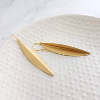 Long Gold Earrings, oval earring, simple gold earring, long simple gold earring, pod earring, folded leaf earring, long narrow earring - Constant Baubling