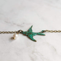 Little Bird Necklace, verdigris patina, antique brass chain, bronze necklace, blue green patina, flying bird necklace, pearl necklace, small - Constant Baubling