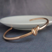 Rose Gold Knot Bracelet, tie the knot bracelet, bridesmaid bracelet, pretzel knot, knot cuff, gold cuff bracelet, thin cuff, oval bangle - Constant Baubling
