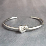 Silver Knot Bracelet - tie the knot bracelet, bridesmaid bracelet, pretzel knot, knot cuff, silver cuff bracelet, thin cuff, oval bangle - Constant Baubling