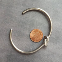 Silver Knot Bracelet - tie the knot bracelet, bridesmaid bracelet, pretzel knot, knot cuff, silver cuff bracelet, thin cuff, oval bangle - Constant Baubling