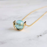 Modern Gold Necklace, blue glass pendant, spinner necklace, orb necklace, gold half circle necklace, sky blue necklace, eclipse necklace - Constant Baubling