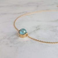 Modern Gold Necklace, blue glass pendant, spinner necklace, orb necklace, gold half circle necklace, sky blue necklace, eclipse necklace - Constant Baubling