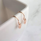 Tiny Skull Earrings, rose gold skull, rose gold earring, Halloween earring, small skull earring, skull dangle earring, pink skull earring - Constant Baubling
