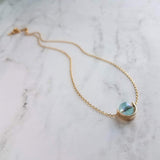 Modern Gold Necklace, blue glass pendant, spinner necklace, orb necklace, gold half circle necklace, sky blue necklace, eclipse necklace - Constant Baubling